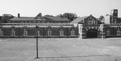 Drill Hall viewed from Upper Pembroke, looking N towards western section, with Block A behind
