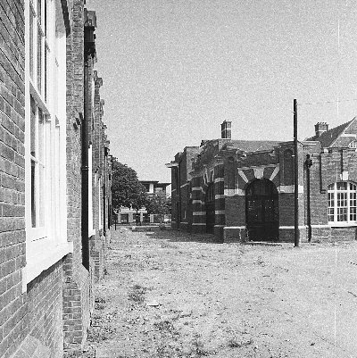Western end of Drill Hall, adjacent to the Canteen building